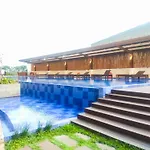 Big And Cozy Studio At Azalea Suites Apartment By Travelio